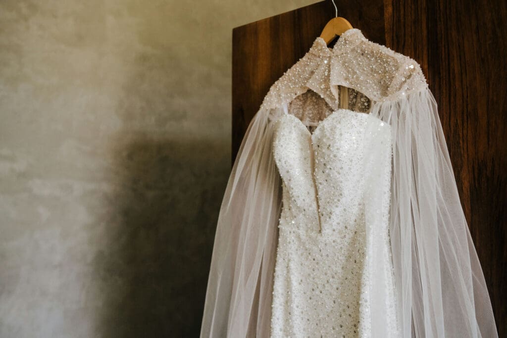 Beaded wedding dress hanging