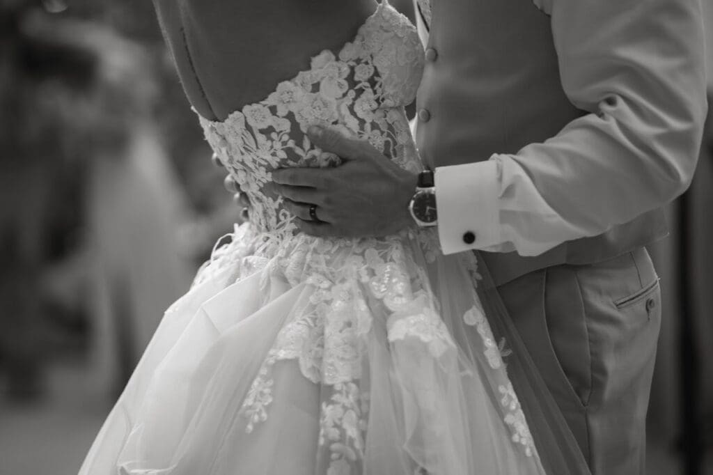 Bride in lace wedding dress with fitted bodice