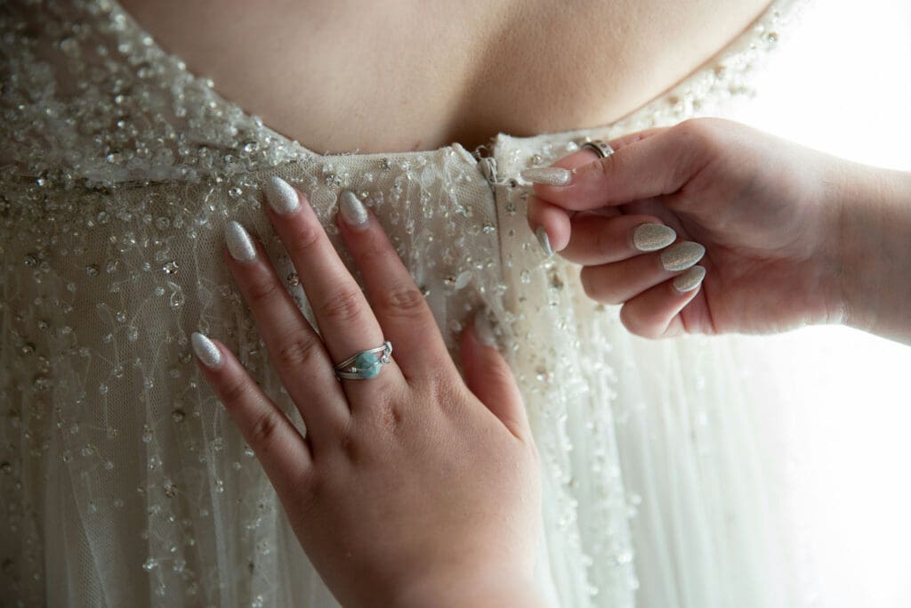 Hand fastening beaded wedding dress zipper